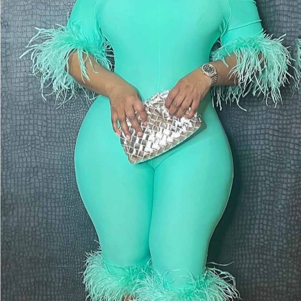 Jumpsuit with Feather Accents in Aqua